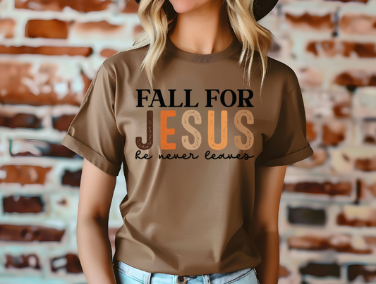 woman wearing a espresso tee with text that read "fall for Jesus he never leaves"